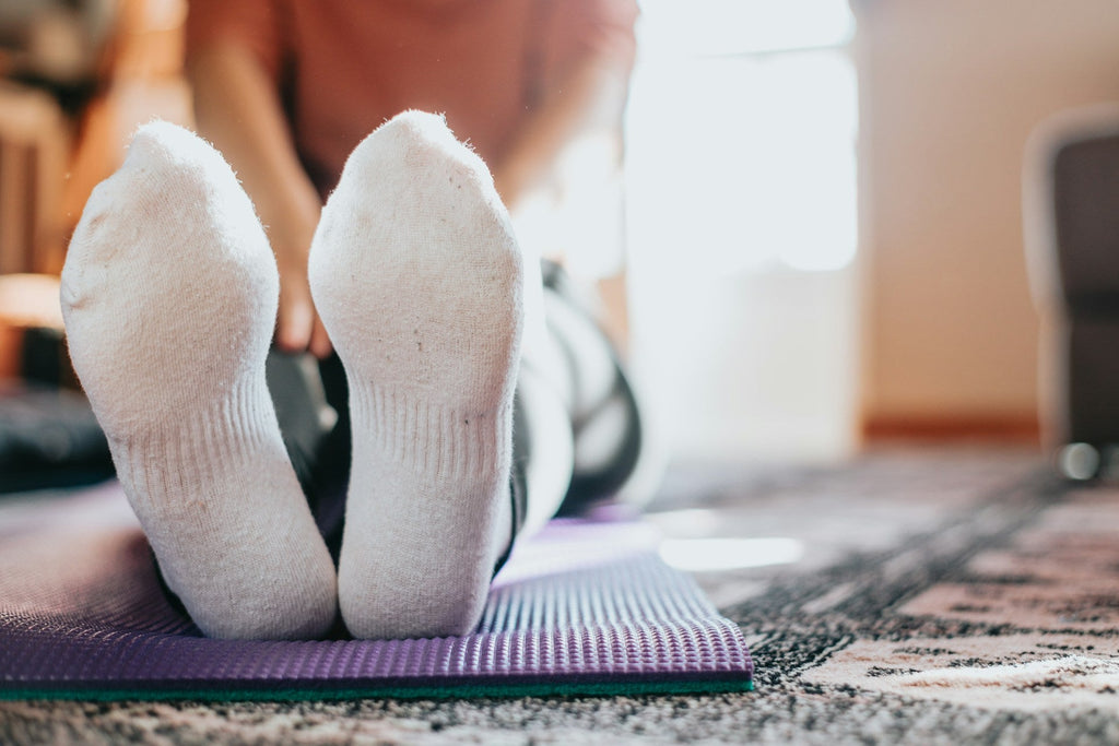 Why Dirty Pilates Socks Can Mess With Your Workout